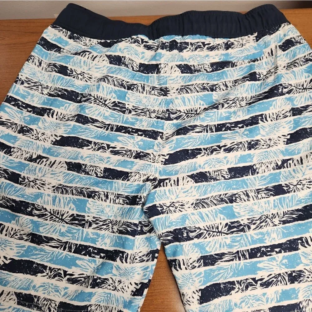 NWT Bass Pro Shops XL blue and palm leaf swim trunks.